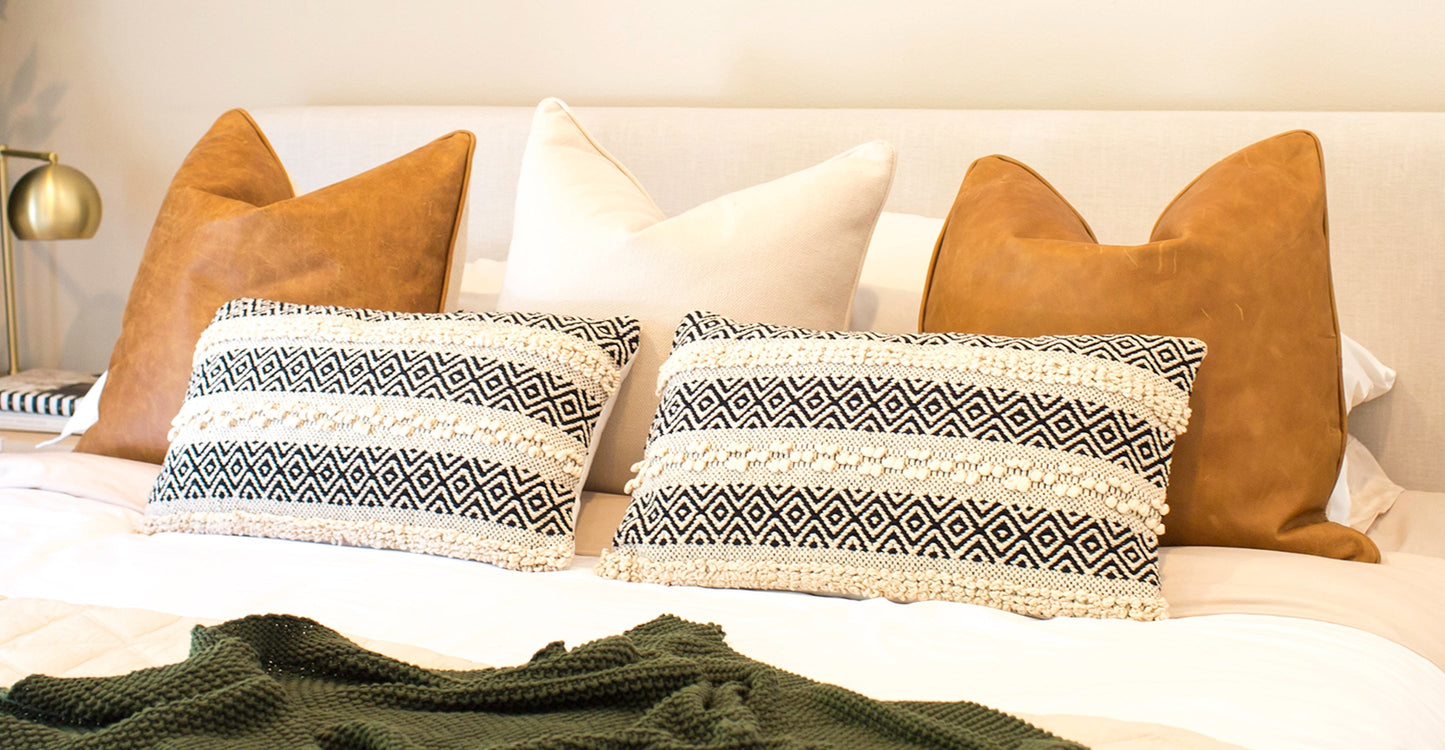 Dobla Throw Pillow